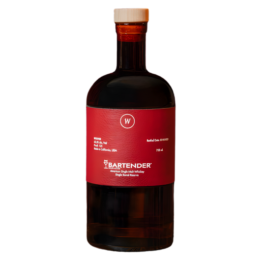 A dark glass bottle with a brown cap and red label reads Wolves Whiskey x Bartender Magazine 11 Year American Single Malt Limited Single Barrel, showcasing this exclusive single barrel release. The bottle is photographed on a white background.