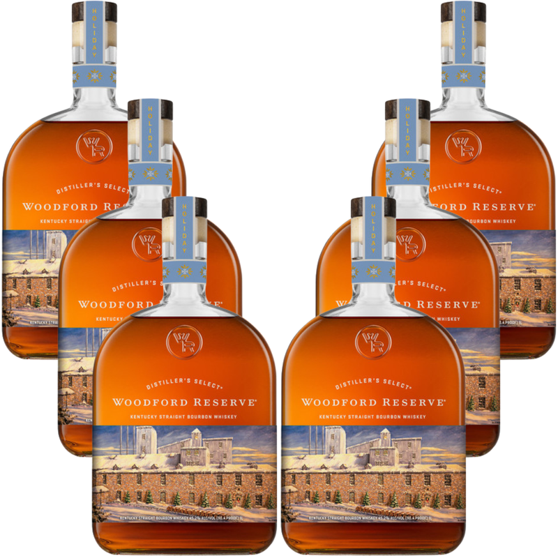 Load image into Gallery viewer, Six bottles of Woodford Reserve Bourbon Holiday Edition 2026 750ml are arranged in two rows of three, displaying their rich golden-brown liquid and festive labels.
