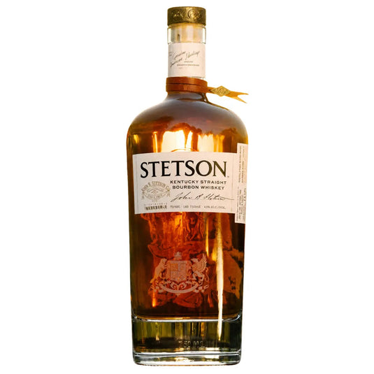 A bottle of Stetson Kentucky Straight Bourbon Whiskey by Stetson, distinguished by its gold cap and detailed label, showcases amber-brown bourbon within—celebrated for its high-rye profile and crafted in partnership with Bardstown Bourbon Company.