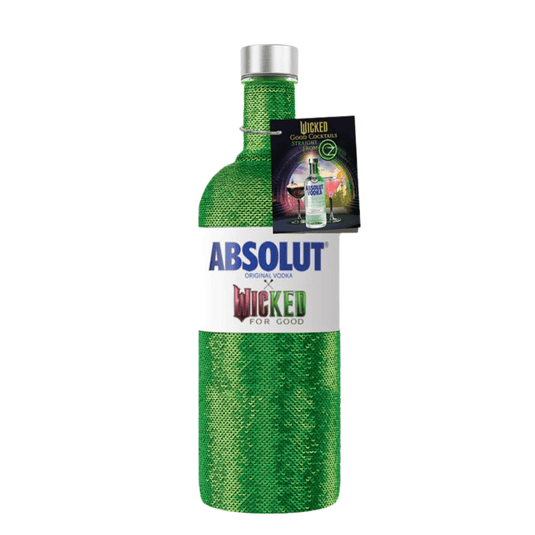 A bottle of Absolut Vodka’s Absolut X Wicked Limited Edition, wrapped in shimmering green fabric, features a 