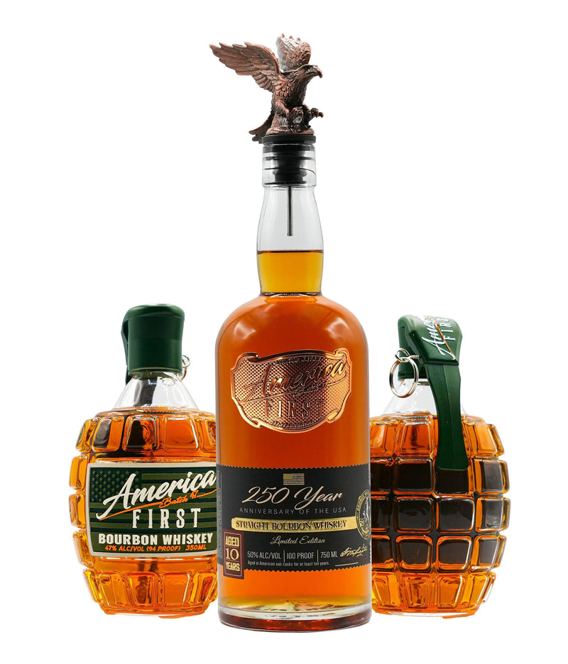 Load image into Gallery viewer, Three whiskey bottles: two America First Grenade Whiskey Bottles, labeled “America First Bourbon Whiskey,” flank a central America First 250th Anniversary Bourbon bottle with an eagle stopper. All bottles, part of the America First Limited Edition Bourbon Bundle, contain amber liquid.
