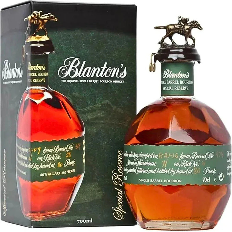 Load image into Gallery viewer, A bottle of Blanton's Green Label Bourbon 700ml by Blanton's Bourbon stands next to its black and green box, featuring a horse and jockey stopper and distinctive green label—a true collector’s item.
