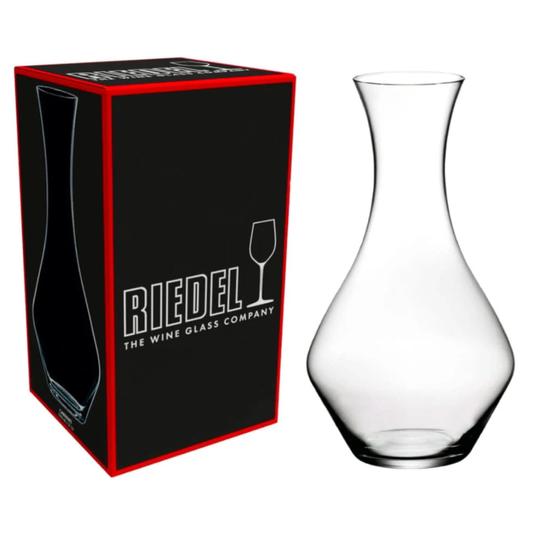 The RIEDEL Wine Decanter Cabernet Sauvignon by Riedel is displayed beside its black and red box, which features the brand’s logo and a wine glass icon—an elegant choice for serving Cabernet Sauvignon.