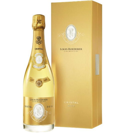 A bottle of Louis Roederer Cristal Champagne Luxury Cuvée 2016 stands beside its matching gold box, both featuring refined white and gold labels with the Louis Roederer logo and elegant detailing.