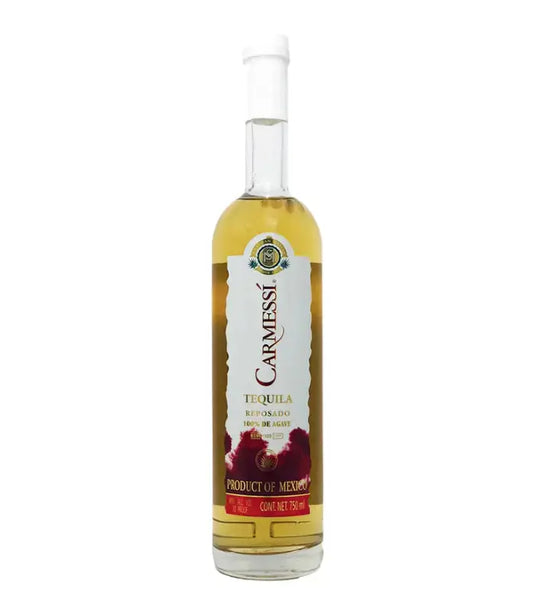 A 750mL bottle of Carmessi Reposado Tequila features a clear label, golden tequila, and striking red agave designs at the base. Crafted from 100% de agave and proudly labeled as a Product of Mexico, this smooth reposado comes from the Carmessi brand.