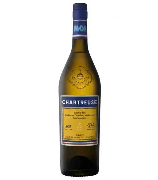 A 700mL bottle of Chartreuse Cuvée des MOF Liqueur by Chartreuse, featuring a blue and yellow label with a blue cap, set against a white background—ideal for enhancing craft cocktails.