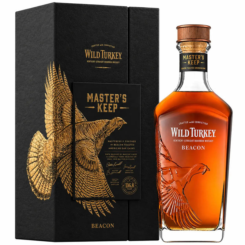 Load image into Gallery viewer, Wild Turkey Master’s Keep Beacon by Wild Turkey is a limited edition Kentucky Straight Bourbon Whiskey, elegantly presented in a glass bottle with a cork and packaged in an eye-catching black and gold box featuring an illustrated soaring turkey, emphasizing its premium heritage.
