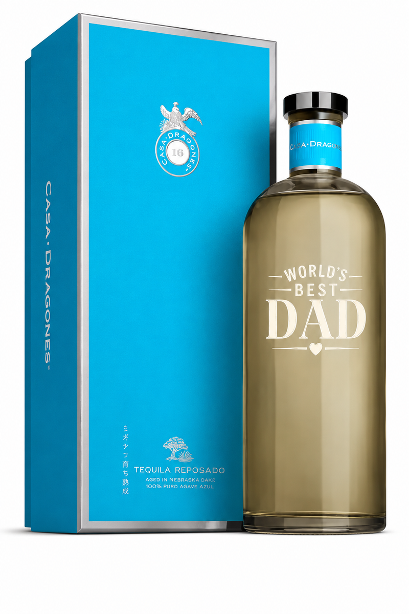 Load image into Gallery viewer, A blue box of Tequila Casa Dragones Reposado Mizunara Oak “World’s Best Dad” Deep Etched Tequila with silver accents and minimalist design makes a perfect Father’s Day gift.
