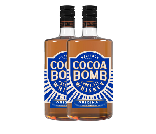 Two bottles of Cocoa Bomb Whiskey - 2 Bottle by Heritage Distilling, featuring blue and white 