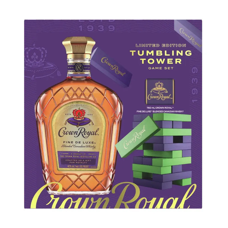 Load image into Gallery viewer, The Crown Royal Deluxe with Tumbling Tower Gift Set by Crown Royal includes a bottle of Canadian whisky and a tumbling tower game, all elegantly packaged in a purple box with gold and green accents that highlights the brand’s label and images of the tumbling tower pieces.
