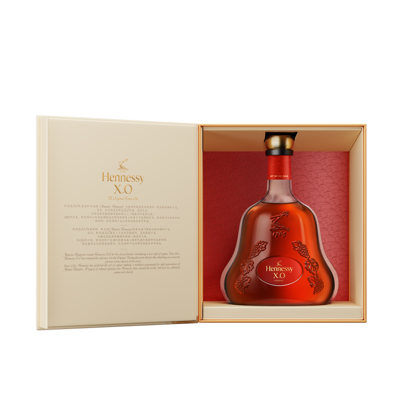 Load image into Gallery viewer, The Hennessy X.O Lunar New Year 2026 Limited Edition by Xu Zhen is displayed in an elegant open gift box with gold and red accents, embossed details, and printed text on the inside cover.
