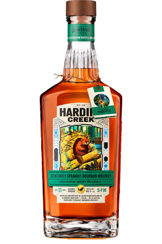 A bottle of Hardin’s Creek Warehouse Series Release 2 The Beaver One 11 Year Barrel Proof Bourbon Whiskey, featuring a label with an illustration of a beaver on a log and a small matching tag tied around the neck.
