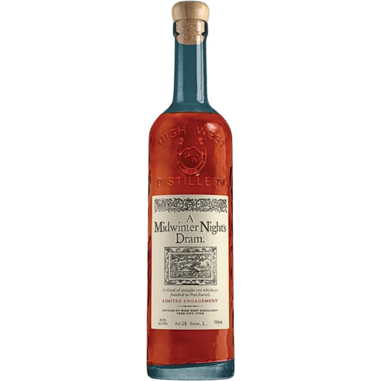 A tall, clear bottle of High West A Midwinter Night’s Dram Act 14 (Pre-Order) whiskey from High West Distillery features a cork top and an ornate cream label. The amber liquid inside is visible, highlighting this limited-release rye whiskey finished in port barrels. “High West Distillery” is embossed on the glass.