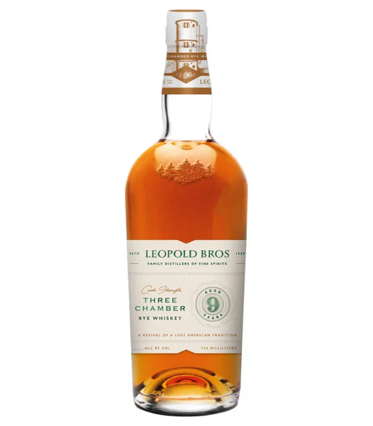 Leopold Bros 9 Year Three Chamber Cask Strength Rye Whiskey, 750ml, features a gold cap and a white-green label. This amber spirit makes a distinctive alternative to any classic bourbon gift set.