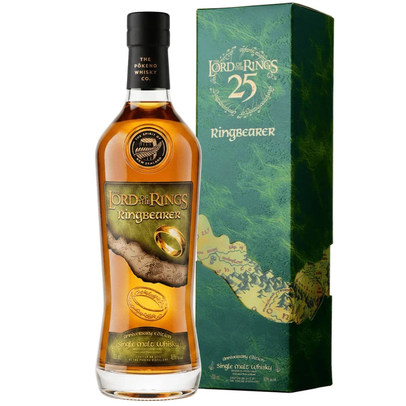 Load image into Gallery viewer, A bottle of Pōkeno The Lord of the Rings 25th Anniversary Ringbearer “The One Ring” Engraving Edition Single Malt Whisky 700mL by Pōkeno Whisky stands next to its green, gold, and blue box, both adorned with Lord of the Rings themed artwork and imagery of the One Ring. This exclusive New Zealand single malt is part of the coveted “The One Ring” Engraving Edition, making it a standout piece for any Lord of the Rings whisky collector.
