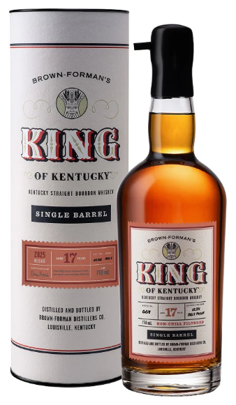 A bottle of King of Kentucky 17 Year Old Single Barrel Bourbon 2025 Release stands beside its matching cylindrical box, both adorned with vintage-inspired labels in red and black, emphasizing this limited-edition bourbon from King of Kentucky.