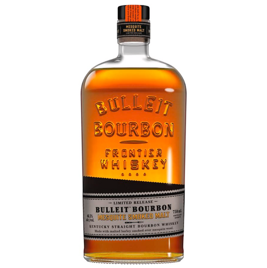 A bottle of Bulleit Bourbon Mesquite Smoked Malt Limited Release, featuring amber liquid, an embossed label, a black and orange cap, and detailed front text.