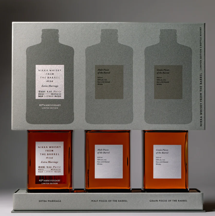 Load image into Gallery viewer, The Nikka From The Barrel Extra Marriage Gift Set features three rectangular bottles in a gray 40th Anniversary Limited Edition box, celebrating Nikka’s renowned Japanese whisky craftsmanship.
