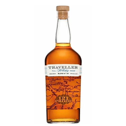 A bottle of The Traveller Whiskey’s Traveller Full Proof Whiskey 121 Proof By Chris Stapleton, a collaboration with Buffalo Trace, featuring map-inspired graphics and a wooden cap.
