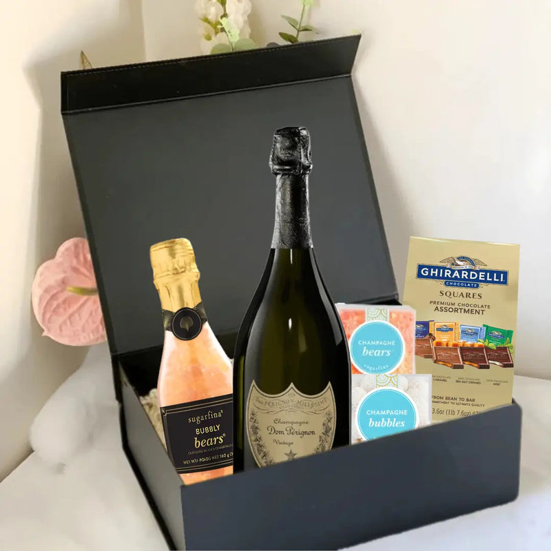 Load image into Gallery viewer, The Premium Champagne Gift Box by Main Street Liquor includes champagne, champagne gummy bears, bath bubbles, and Ghirardelli chocolates—an elegant choice for luxury Champagne gifts.
