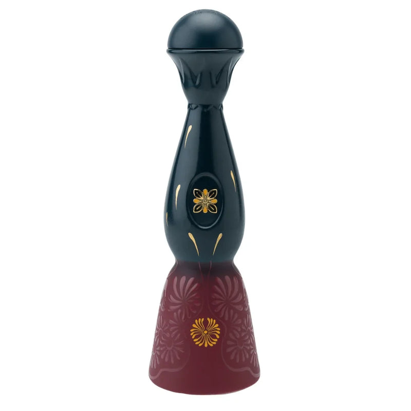 Load image into Gallery viewer, A dark, bell-shaped Clase Azul Día de Muertos Trascender 2026 Limited Edition Añejo Tequila 1L decanter with a round stopper, featuring gold floral accents on the neck and a base with deep red engraved floral patterns.
