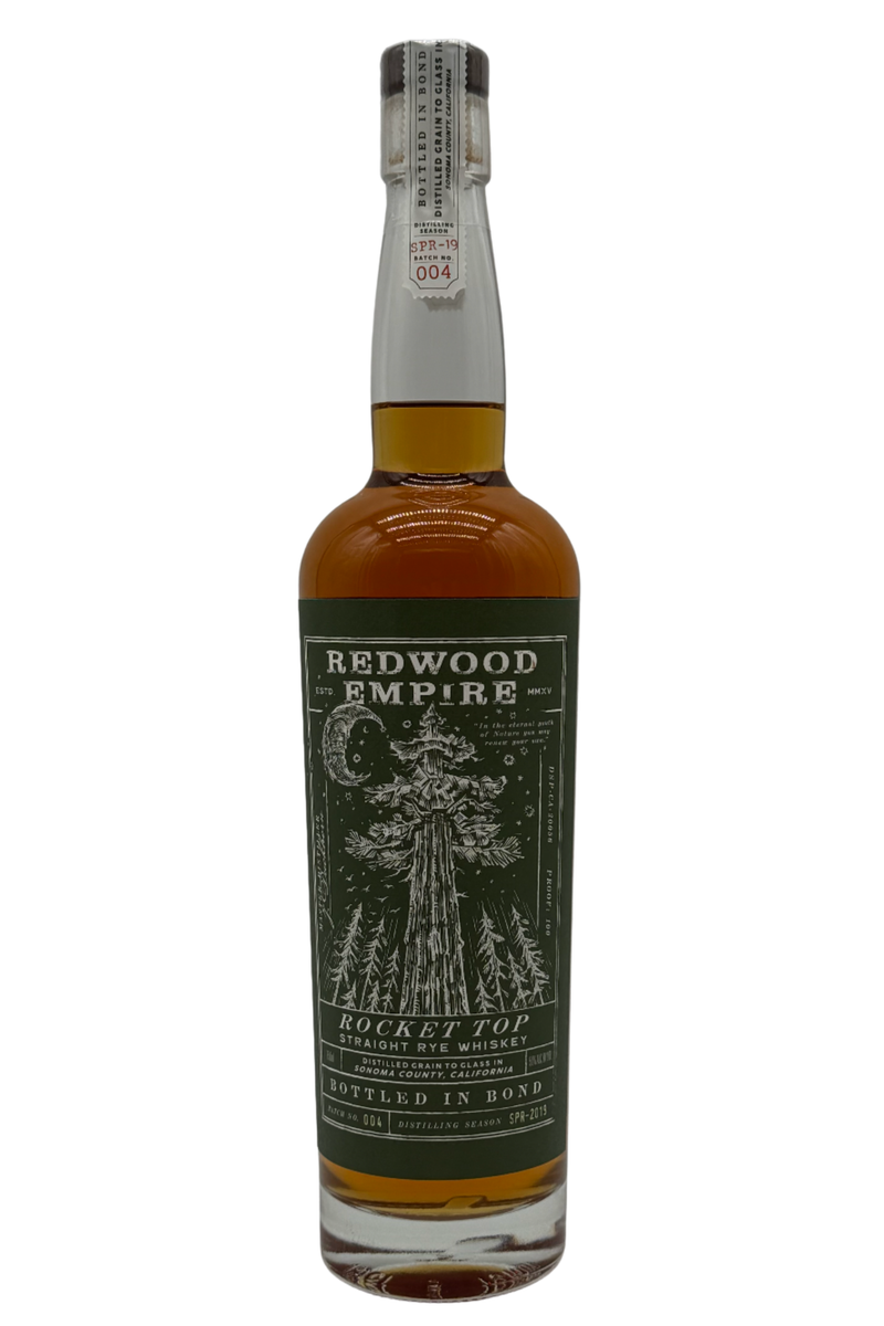 Load image into Gallery viewer, A bottle of Redwood Empire Rocket Top Bottled in Bond Straight Rye Whiskey Batch 004 2025 Release by Redwood Empire Whiskey, from Sonoma County, with a green label depicting a tall redwood tree, forest, moon, clear wrapper, and white cap label.
