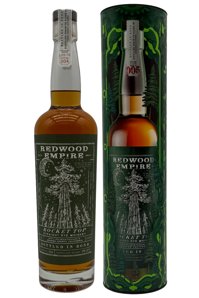 Load image into Gallery viewer, A bottle of Redwood Empire Rocket Top Bottled in Bond Straight Rye Whiskey Batch 004 2025 Release by Redwood Empire Whiskey stands beside its matching green cylinder, both adorned with a redwood tree and forest-inspired Sonoma County design.
