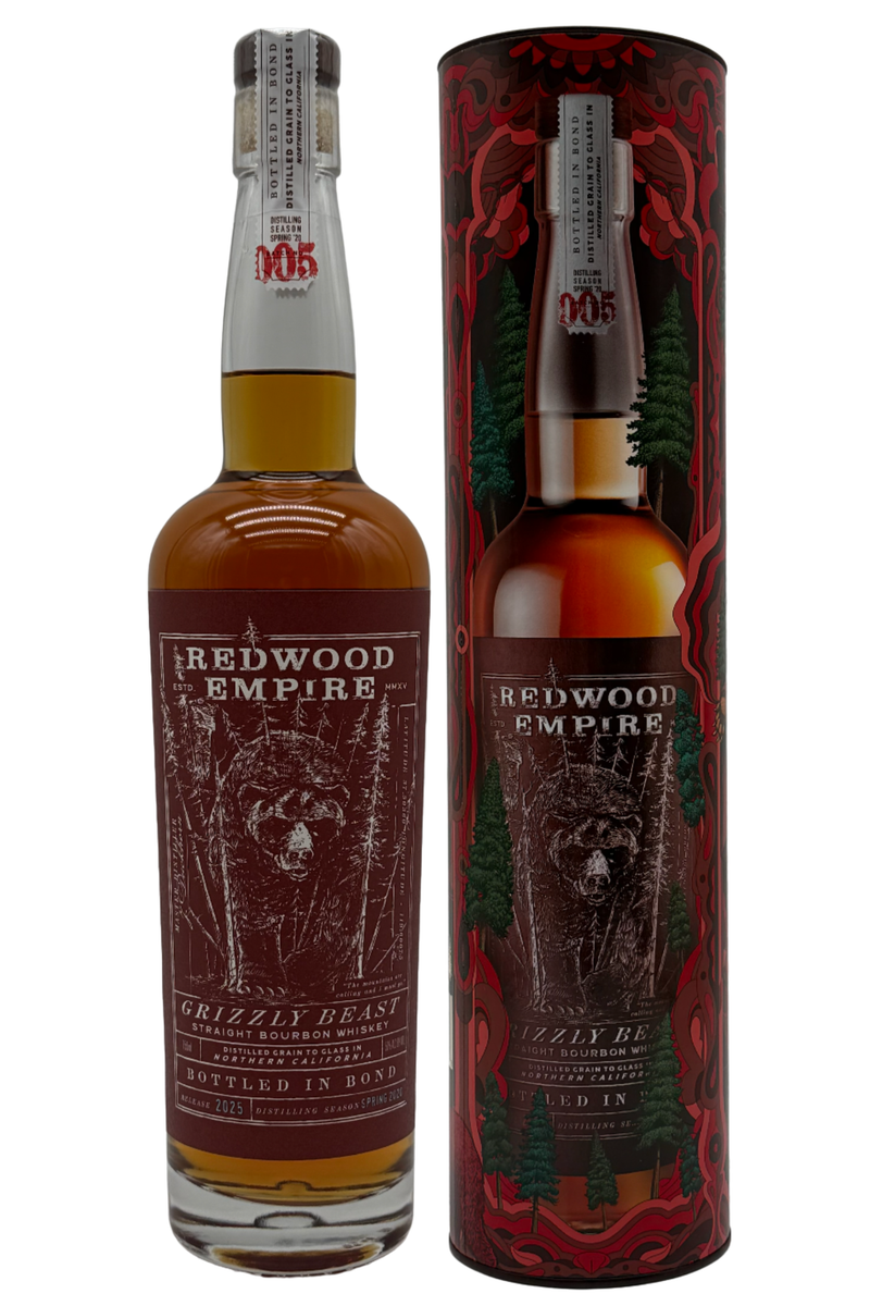 Load image into Gallery viewer, A bottle of Redwood Empire Grizzly Beast Bottled in Bond Straight Bourbon Whiskey Batch 005 2025 Release by Redwood Empire Whiskey stands beside its matching cylindrical box, both boasting brown labels with bear art and forest-inspired red and green designs.
