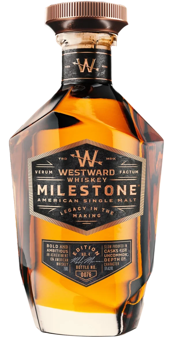 Load image into Gallery viewer, A bottle of Westward Whiskey Milestone Edition No. 4 American Single Malt (Pre-Order), a limited release from Westward, features a striking geometric design with amber liquid visible inside and showcases detailed labeling along with signature Westward branding.
