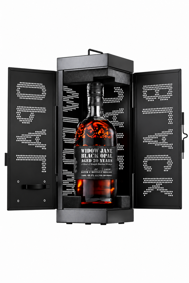 Load image into Gallery viewer, A bottle of Widow Jane Black Opal 20 Year Mizunara Oak Finished Bourbon 99 Proof 750mL inside an open black metal cabinet with the word BLACK perforated into the doors.
