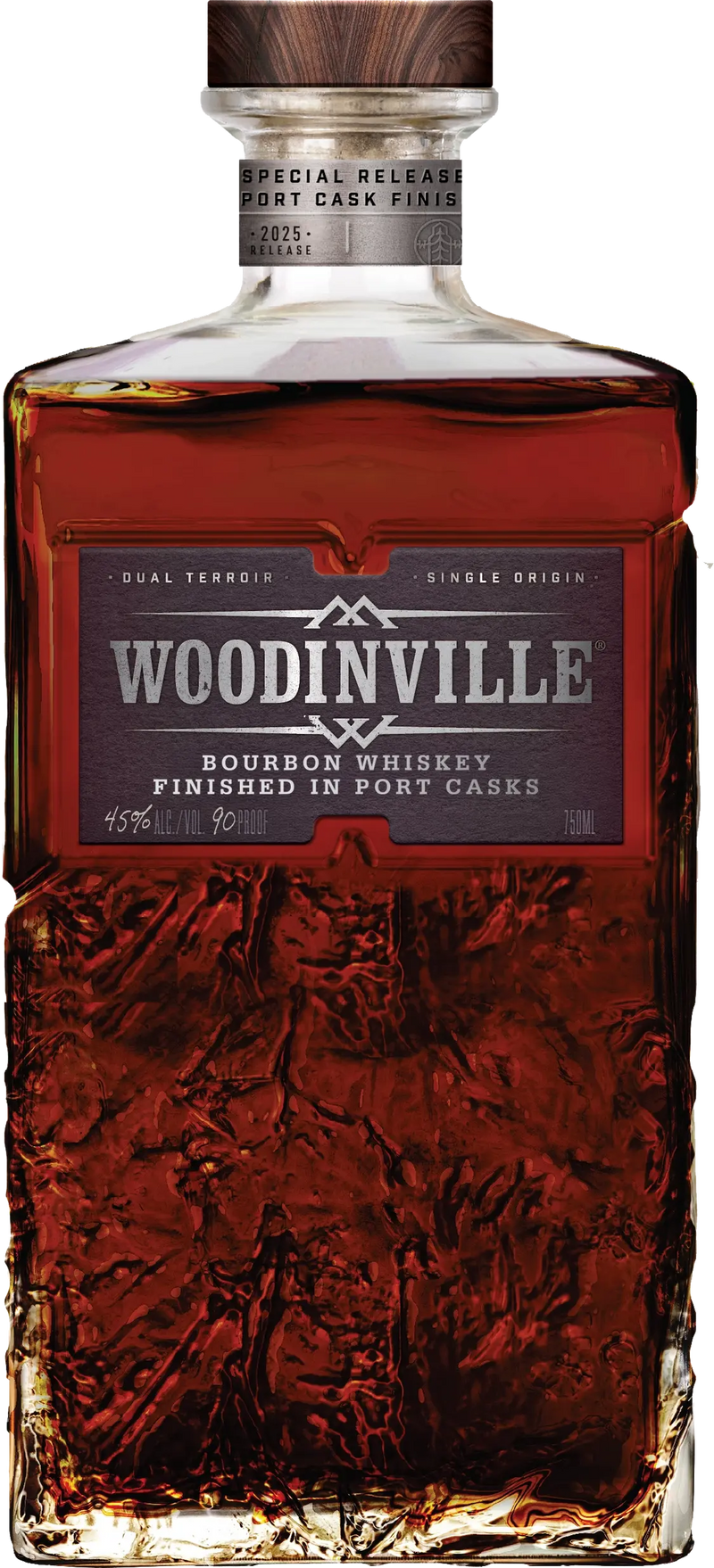 Load image into Gallery viewer, A bottle of Woodinville Port Finished Straight Bourbon, a straight bourbon whiskey from Woodinville, finished in ruby port casks. The label reads Special Release and indicates 45% ALC/VOL (90 PROOF), while the glass features a textured pattern on its lower portion.
