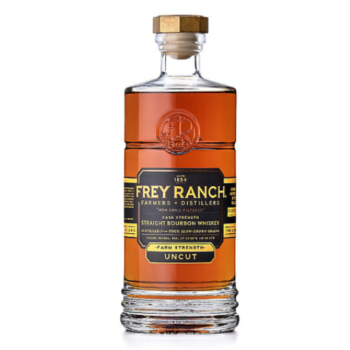 Load image into Gallery viewer, A clear glass bottle of Frey Ranch Straight Bourbon Cask Strength Farm Strength Uncut 125.16 features a wooden cap and black-and-gold label, highlighting its rich amber barrel-strength bourbon from Frey Ranch.
