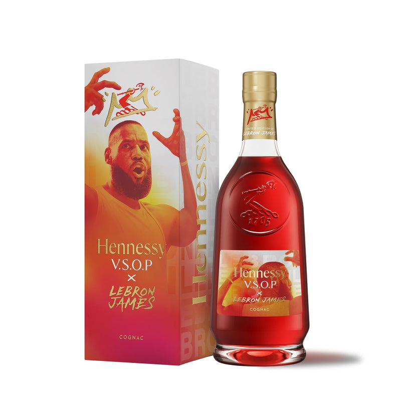 Load image into Gallery viewer, The Hennessy V.S.O.P x LeBron James Limited Edition Cognac features a striking gold and red box with LeBron’s image and name, displayed alongside the iconic Hennessy bottle.
