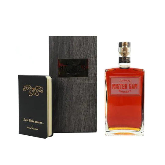 Load image into Gallery viewer, A bottle of Sazerac Mister Sam Tribute Whiskey Second Edition cask strength, presented in a dark wooden box with a black notebook featuring an acorn illustration and the phrase "...from little acorns..." on the cover.
