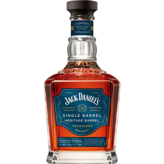 A 750mL bottle of Jack Daniel’s Heritage Toasted Single Barrel 2025 Release with a blue and copper label, clear glass, and a wooden-topped cork. The amber Tennessee whiskey is expertly crafted in toasted oak barrels.