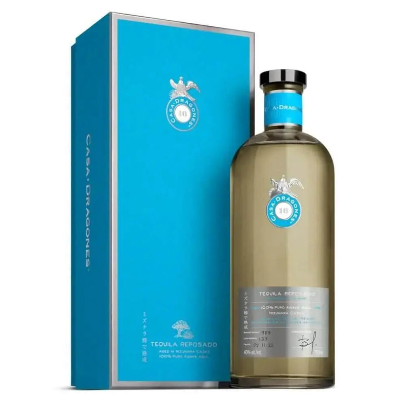Load image into Gallery viewer, A bottle of Tequila Casa Dragones Reposado Mizunara Oak “World’s Best Dad” Deep Etched Tequila is displayed with its matching box—both featuring stylish silver and white accents, making it a sophisticated Father’s Day gift.
