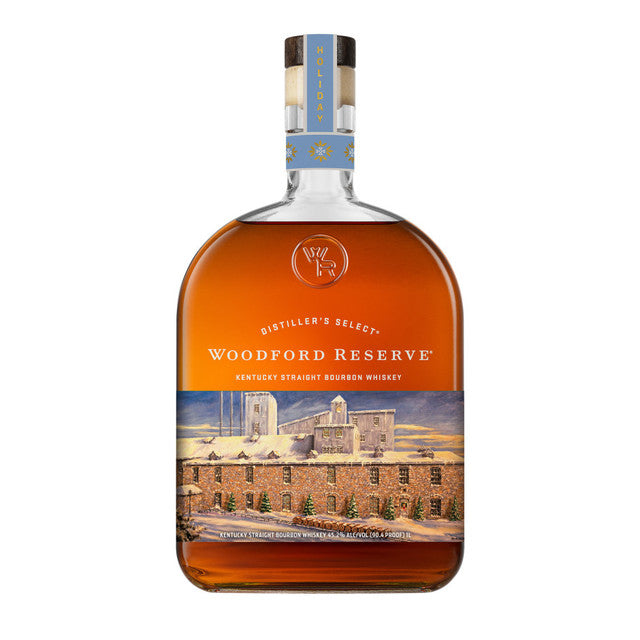 Load image into Gallery viewer, A bottle of Woodford Reserve Bourbon Holiday Edition 2026 750ml, featuring a winter-themed label with a distillery scene and snowflakes on the neck.
